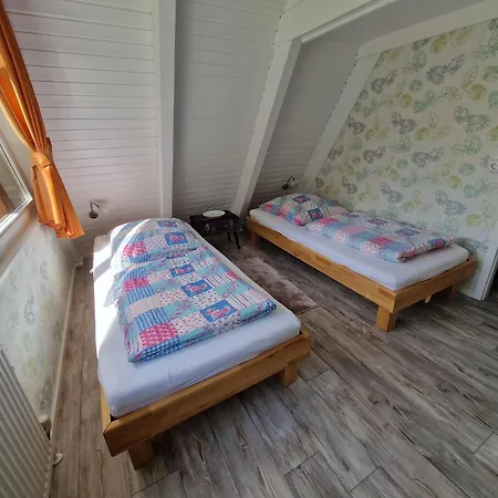 Holiday home Wooden Bungalow With A Terrace In A Wooded Area