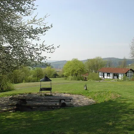 Holiday home Wooden Bungalow With A Terrace In A Wooded Area *